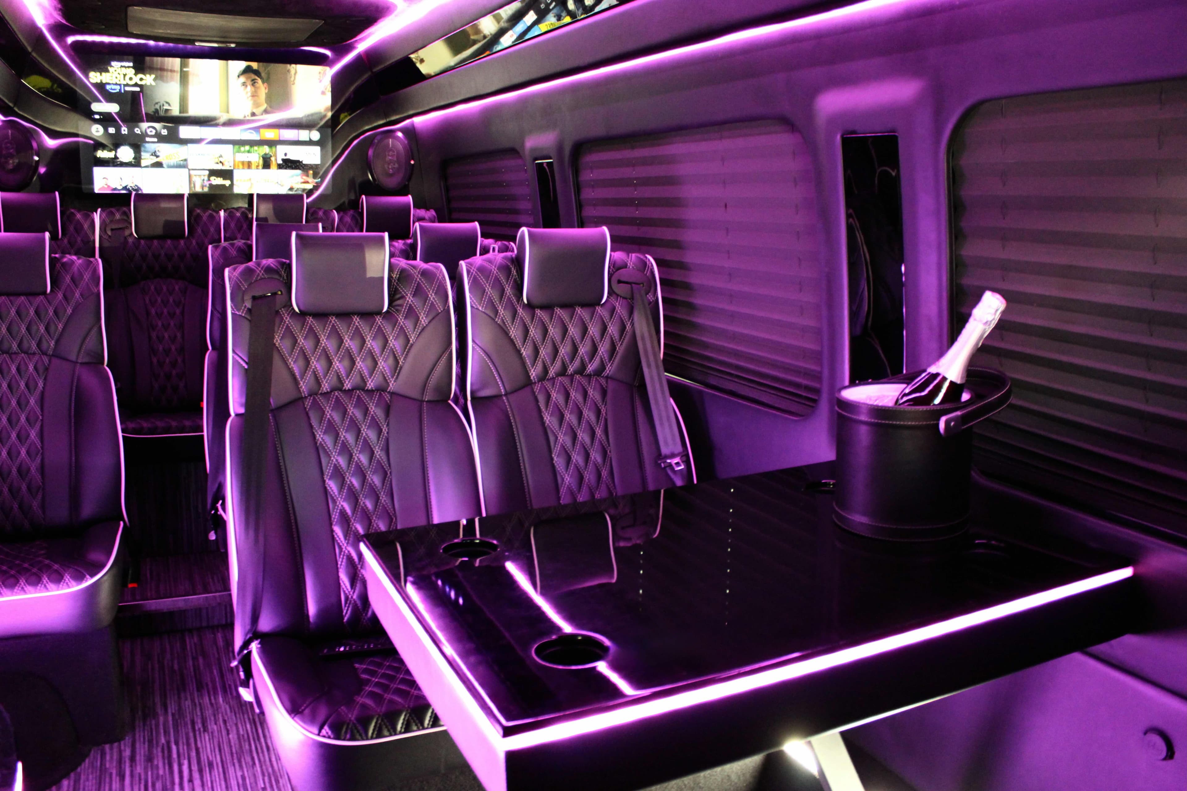 Elegant wedding party arriving in style on a luxury charter bus