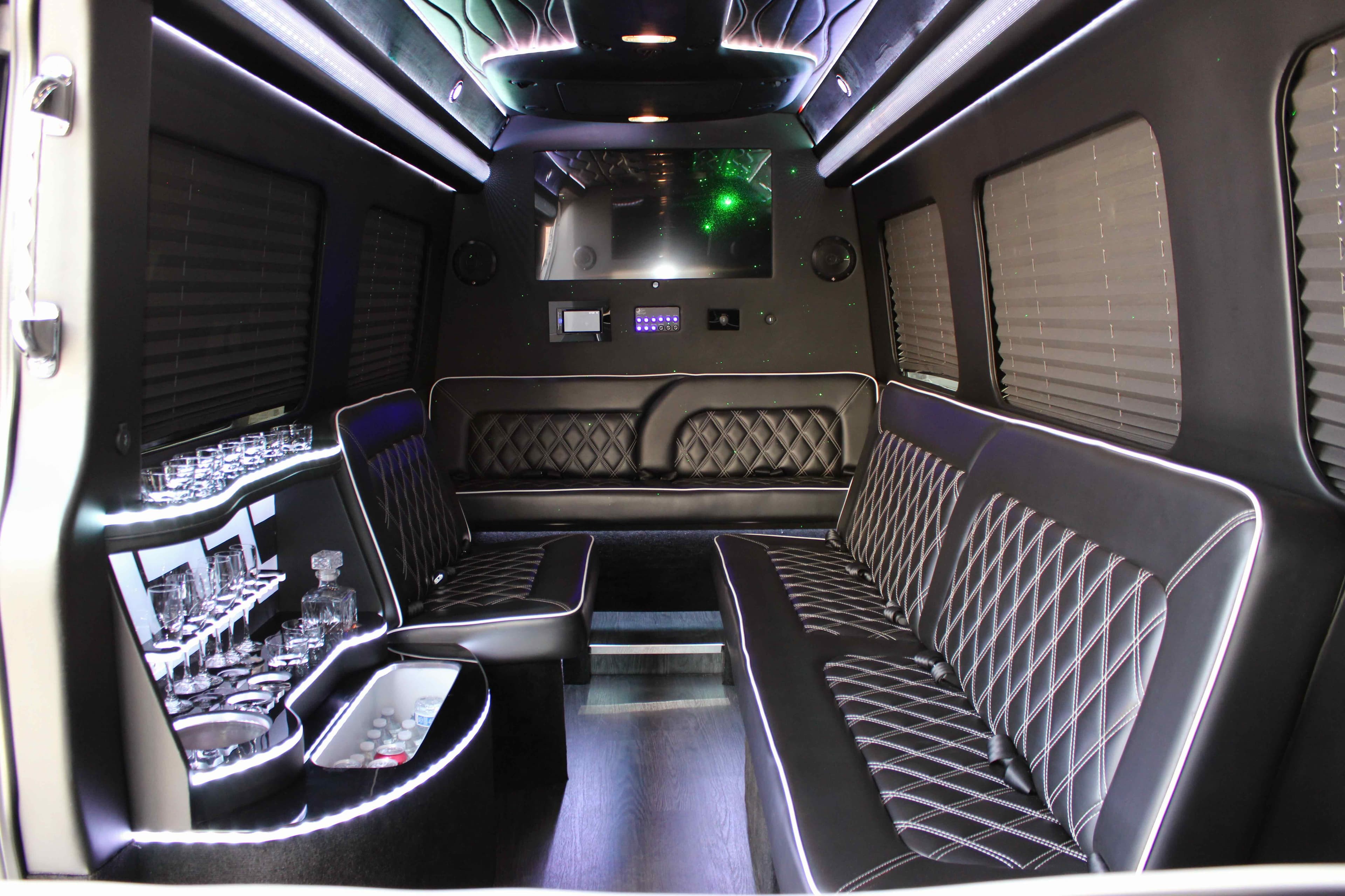 Group heading out for a night on the town in a luxury Elite BHLS charter bus